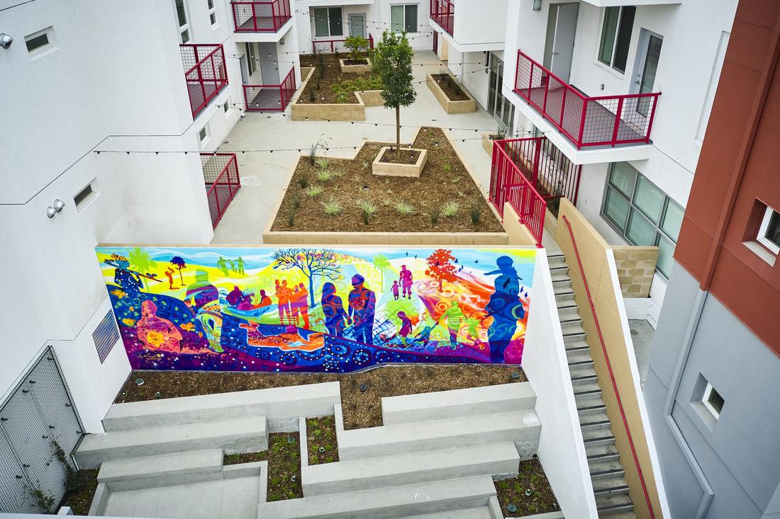 a colorful mural on the side of a building.